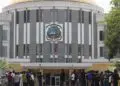 Liberians gather outside the Capitol Building in Monrovia