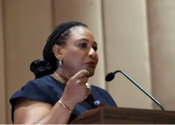 Ambassador Josephine Nkrumah speaks at a podium during an ECOWAS event in Monrovia, supporting Liberia’s bid to host key regional institutions