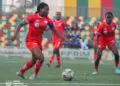 Liberia’s deputy captain Mimi Eiden controls the ball during a WAFU Zone A Women’s Cup match against Mauritania, with teammates in support.