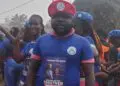 Prince Yeah wearing CDC regalia at a political event before resigning from the party to join Unity Party in Nimba County, Liberia.