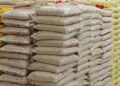Bags of imported rice stacked in a warehouse