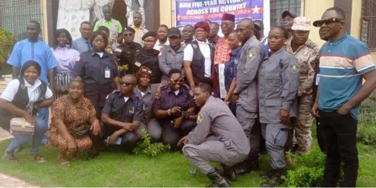 Group photo of Justice Ministry officials, security officers, and local leaders in Grand Gedeh County during the launch of the Gender Policy and Five-Year Action Plan at Tubman Palace.