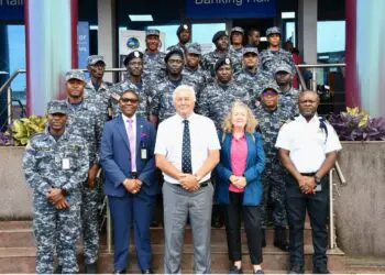 Group photo of Liberia Revenue Authority anti-smuggling officers with IMF experts Kevin Atkison and Jacqueline Penfold at the launch of a customs training mission in Monrovia