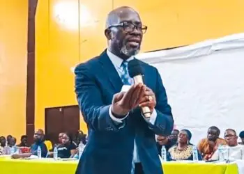 Rep. Jeremiah Sokan addresses constituents at Zwedru City Hall, presenting his legislative report and 2025 vision for Grand Gedeh District #1 development.