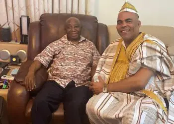 President Joseph Boakai seated with Liberian-born financial strategist Michael G. Müller during a private meeting, highlighting calls for his involvement in Liberia’s economic diplomacy.