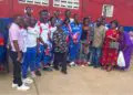 Liberia U-16 basketball team poses with supporters before departing for the 2025 FIBA Afrobasket Youth Championship in Kigali, Rwanda.