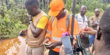 SDI and Liberia Land Authority field team conduct a confirmatory land survey with community representatives in River Cess County to secure customary land rights