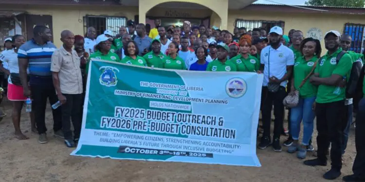 A large group of Nimba County residents, local leaders, and MFDP officials pose together during the launch of Liberia’s 2025 Budget Outreach and FY2026 Pre-Budget Consultation in Sanniquellie, promoting fiscal decentralization and citizen inclusion