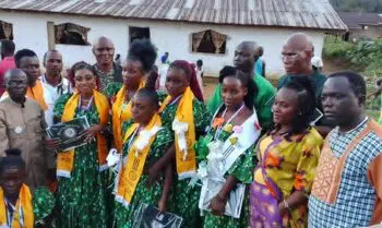 Graduates of Forpoh Vocational Institute pose with officials and instructors during the school’s first graduation ceremony in Grand Kru County, Liberia