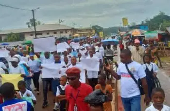 Residents of Harper, Maryland County, march in support of Liberia’s national “Say No to Drugs” campaign amid concerns over weak law enforcement capacity.
