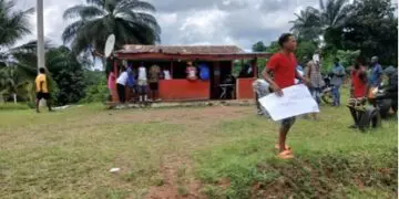 Protesters gather in Yarpah Town, River Cess County, demanding accountability from Superintendent Byron Zahnwea over alleged budget discrepancies.