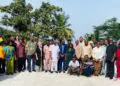 Participants pose at the closeout ceremony of the EU-funded CASTRAP cassava project in Monrovia