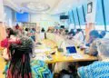 Health stakeholders meeting in Liberia discussing primary health care funding