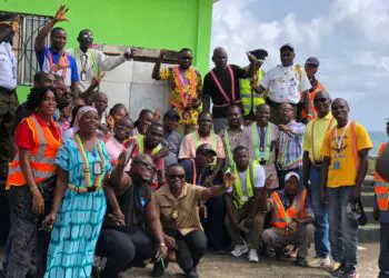 Officials and port workers at Harper Port during inspection visit by Liberia National Port Authority