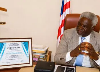 Grand Gedeh Senator Zoe Emmanuel Pennue speaks during an award ceremony in Monrovia.