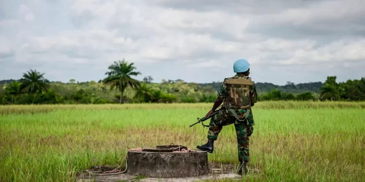 n UNMIL peacekeeper from Ghana on guard duty near the central city of Cestos during a visit by then head of UNMIL Karin Landgren in November 2012.