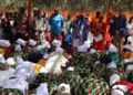 Women Zoes returning their tools and permits at a ceremony held in Sonkay Town, rural Montserrado County. Photo credit: UN Women