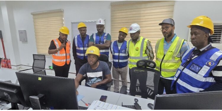 LERC delegation, LEC at CLSG substation control Center at Mount Coffee