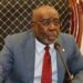 Former Speaker Cllr. J. Fonati Koffa speaking into microphone