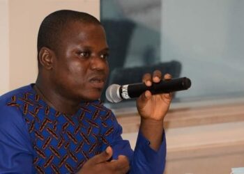 CENTAL head Anderson Miamen speaking into a microphone