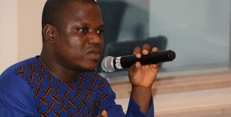 CENTAL head Anderson Miamen speaking into a microphone