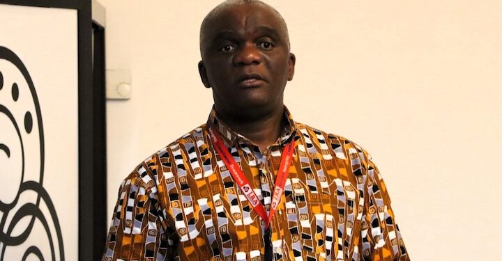 LRA Commissioner General James Dorbor Jallah speaking at a public event, wearing a printed traditional shirt and official badge, following the Senate’s confirmation of new LRA Board members