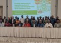 Lawmakers and other participants posed for a group photo with FAO Representative Bintia Stephen Tchicaya