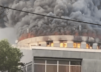 Smoke rises from the burning dome of the Capitol Building during the 2024 arson incident in Monrovia.