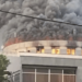 Smoke rises from the burning dome of the Capitol Building during the 2024 arson incident in Monrovia.