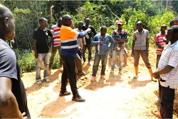 Man talking to a group of people