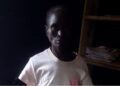 woman standing in the dark