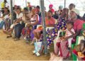 Partial view of community residents awaiting to be ushered in for the free medical