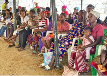 Partial view of community residents awaiting to be ushered in for the free medical