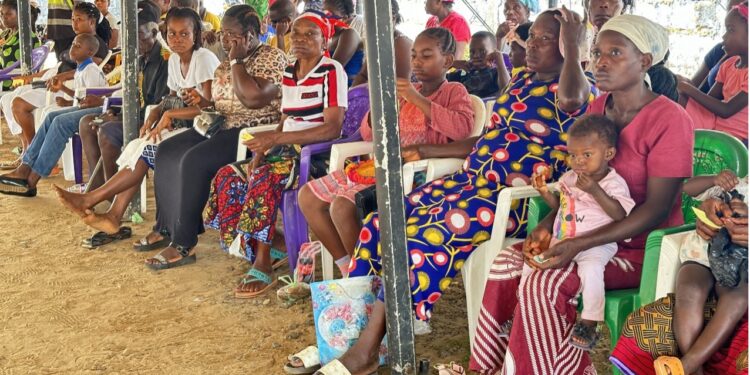 Partial view of community residents awaiting to be ushered in for the free medical