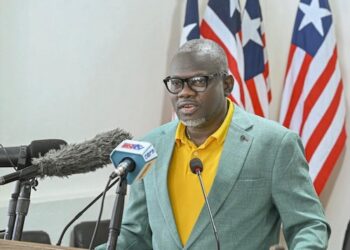 Liberia Information Minister Jerolinmek Piah speaks in Monrovia while clarifying the U.S. visa suspension for Liberians