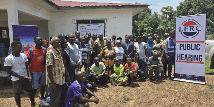 Members of the LERC Board of Commissioners, Ministry of Mines and Energy representatives, and stakeholders at the public hearing in Bopolu, Gbarpolu County.