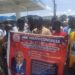 Young members of the ANC Youth Congress hold a banner during a youth leadership retreat in Monrovia, Liberia, promoting the theme “Empowering Youth Leadership for Liberia’s Transformative Development,” with a photo of ANC political leader Alexander B. Cummings