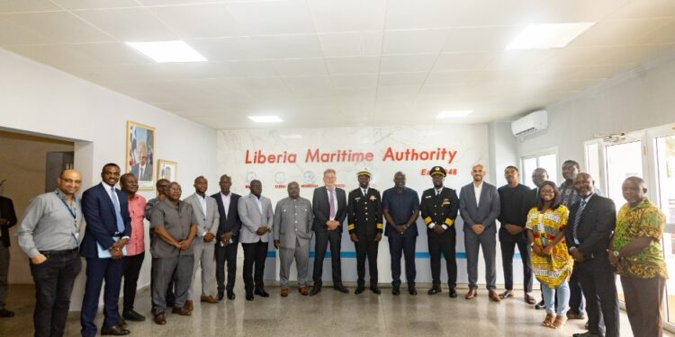 Group photo at Liberia Maritime Authority featuring APM Terminals, Svitzer, government officials, and Captains Jabbah and Lassanah