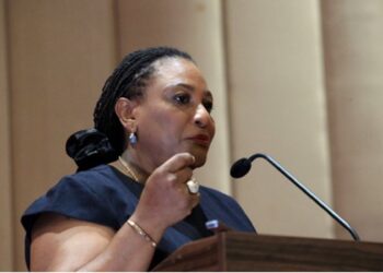 Ambassador Josephine Nkrumah speaks at a podium during an ECOWAS event in Monrovia, supporting Liberia’s bid to host key regional institutions