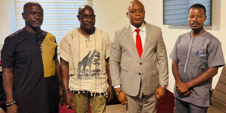 Leaders of CEMESP and AREPT pose after signing a Memorandum of Understanding to boost public awareness on asset recovery and anti-corruption in Liberia.