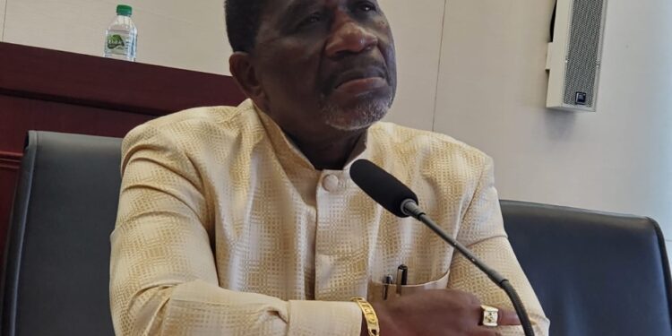 Liberian Labor Minister Cllr. Cooper Kruah addresses lawmakers amid controversy over foreign work permits
