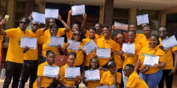 2024/2025 II Leadership Class students from Cuttington University pose with certificates after completing the PAD 401 Leadership Seminar in Suakoko, Liberia