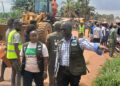 EPA Executive Director Emmanuel Yarkpawolo leads demolition operation against illegal wetland construction in Johnsonville