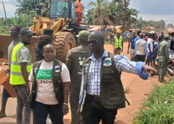EPA Executive Director Emmanuel Yarkpawolo leads demolition operation against illegal wetland construction in Johnsonville