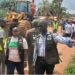 EPA Executive Director Emmanuel Yarkpawolo leads demolition operation against illegal wetland construction in Johnsonville