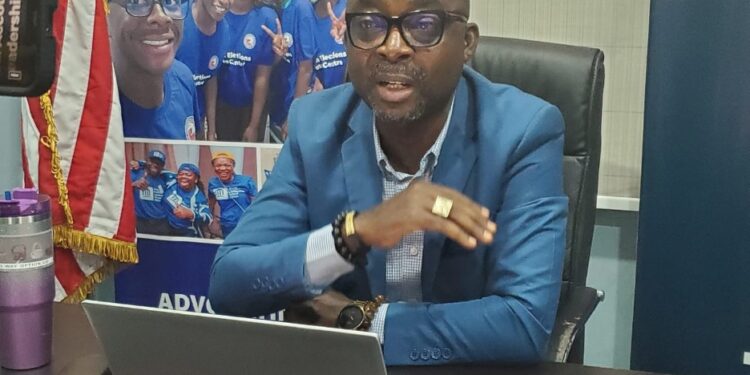 Naymote Executive Director Eddie D. Jarwolo presents the new monitoring framework for Liberia’s 2025–2029 ARREST development plan during the official launch in Paynesville.