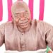 Gbor District Commissioner Ernest W. Doitoe Sr. at his desk during interview about ongoing infrastructure project