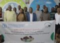 FAO Officer-in-Charge Ibrahim Ahmed and Agriculture Ministry officials pose with participants during the launch of the Sustainable Rice Value Chain Enhancement Project in Liberia.