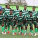 Bukonjadeh FC players line up for a team photo before kickoff during the 2024/2025 football season amid financial and sponsorship challenges.