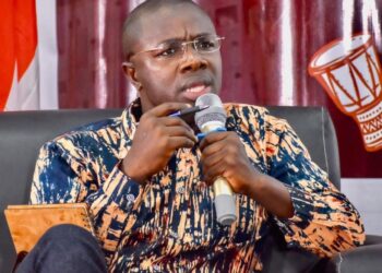 Jefferson T. Koijee former Mayor of Monrovia speaking in a microphone